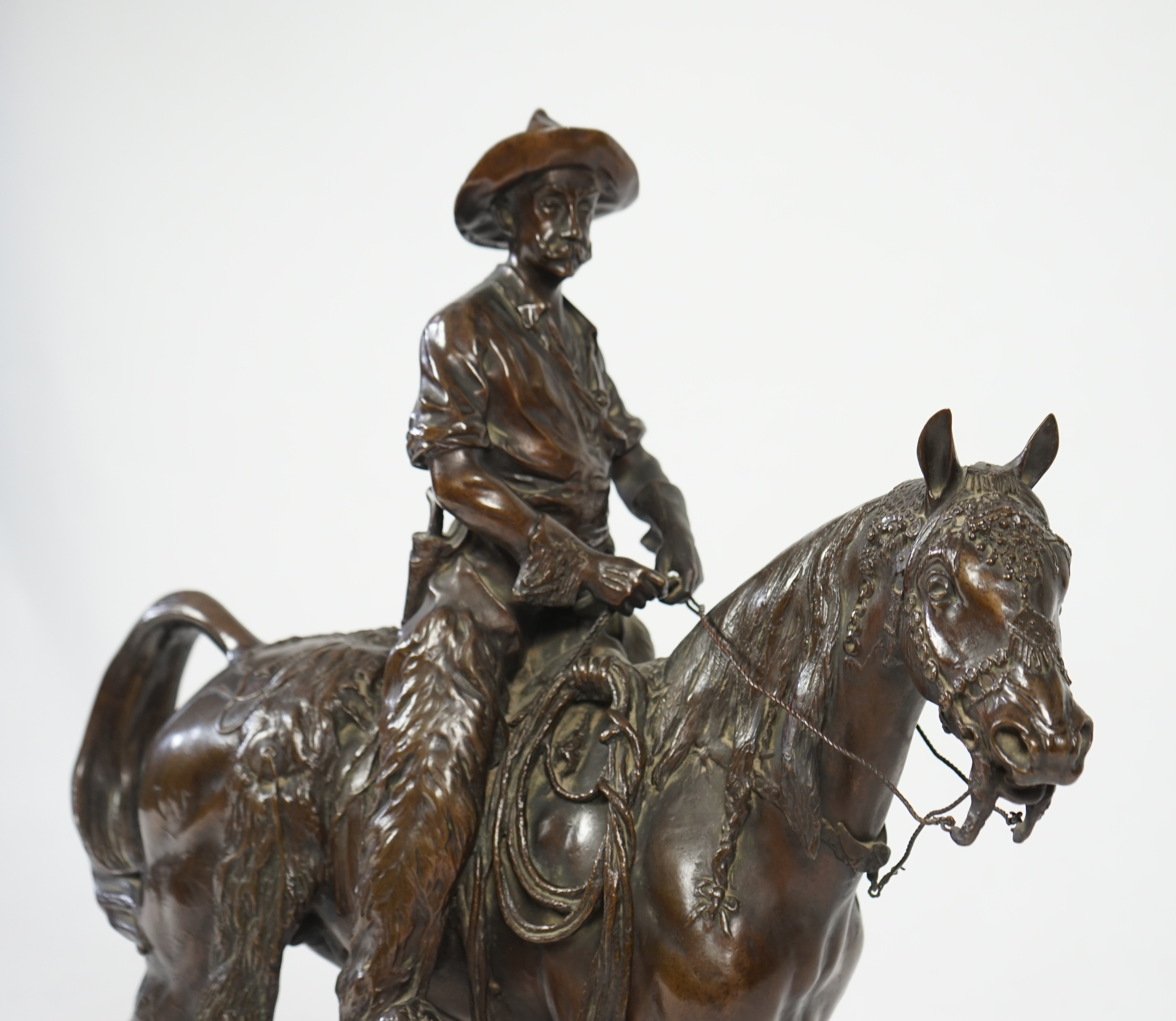 Walter Winans (St. Petersburg, 1852-Parsloe Park, Essex, 1920), a cast bronze of the artist, as a cowboy, riding the Arab stallion Skowronek, 50cm wide, 66cm high, overall 79.5cm high